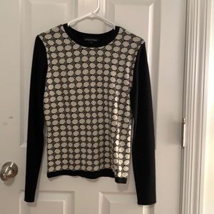 Black and cream colored long sleeve